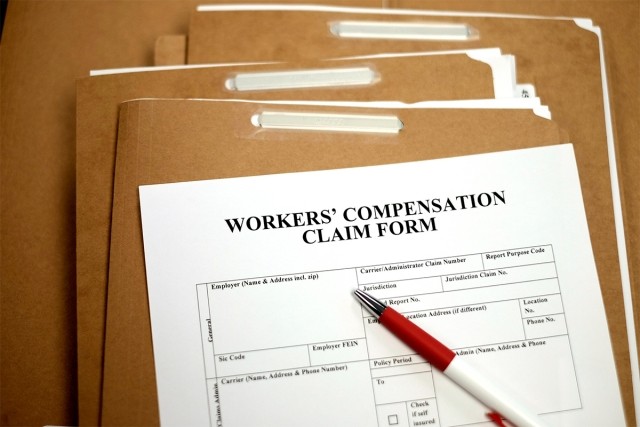 workers' compensation claim with files in background